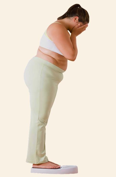 girl weighs herself and cries